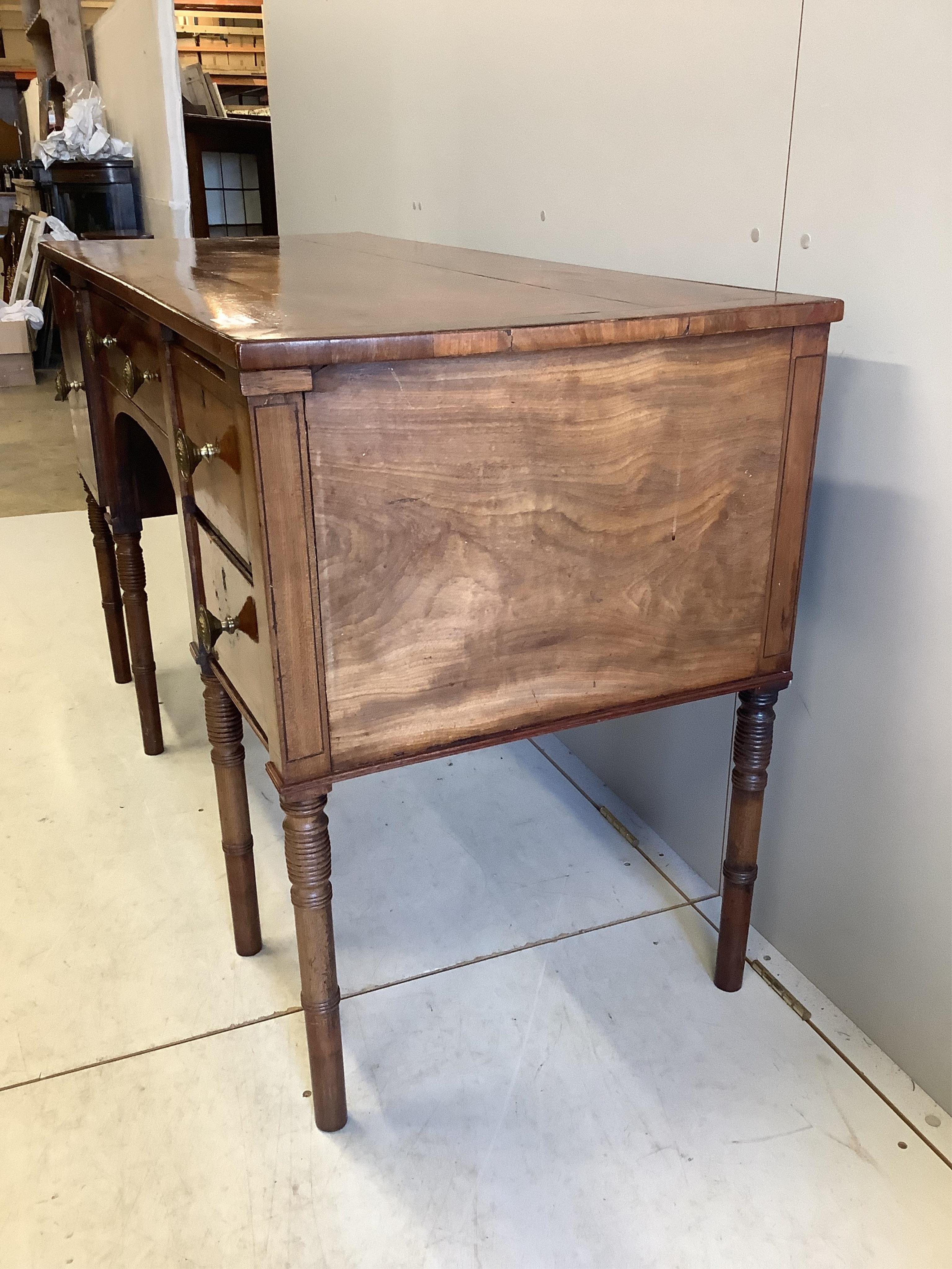 A Regency mahogany sideboard, width 137cm, depth 60cm, height 84cm. Condition - poor